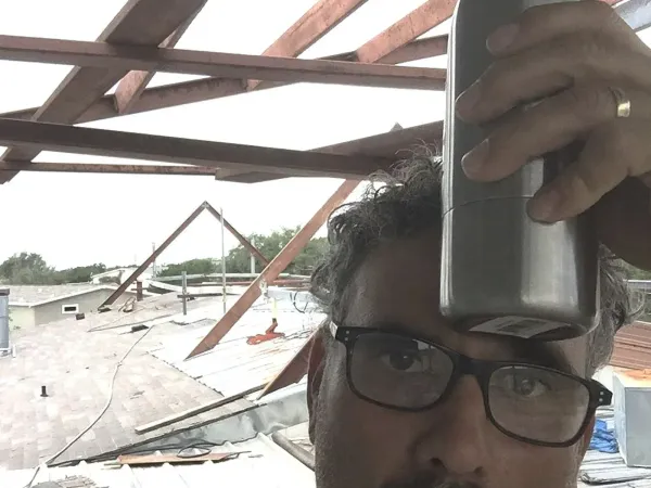 Finished metal roof blue sky Hill Country Texas