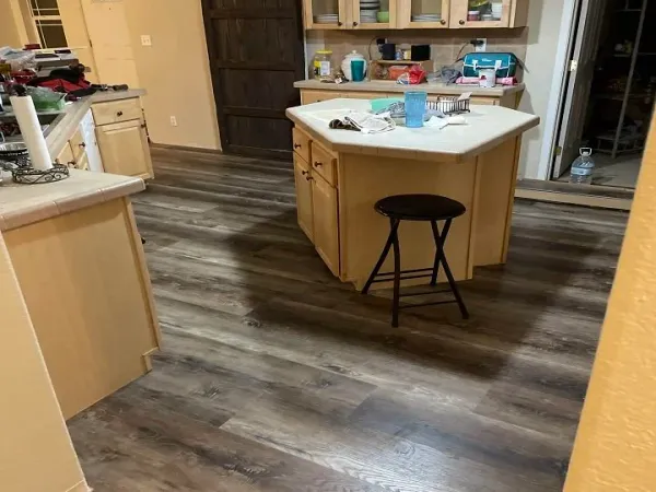 Eric Smith on roof in cowboy hat Kerrville TX